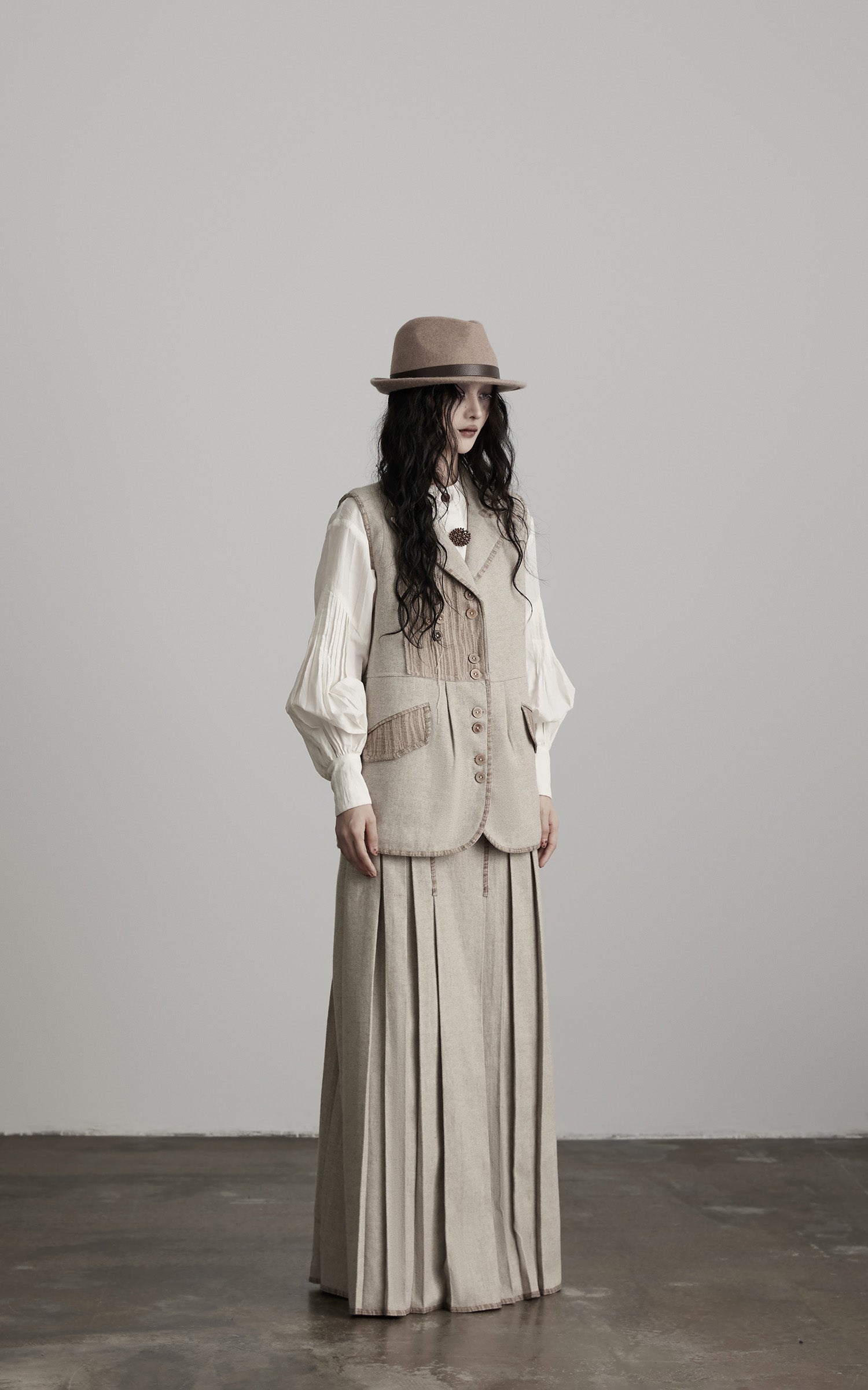 DOINDULGE Wool Patchwork Vest with Textured Panels