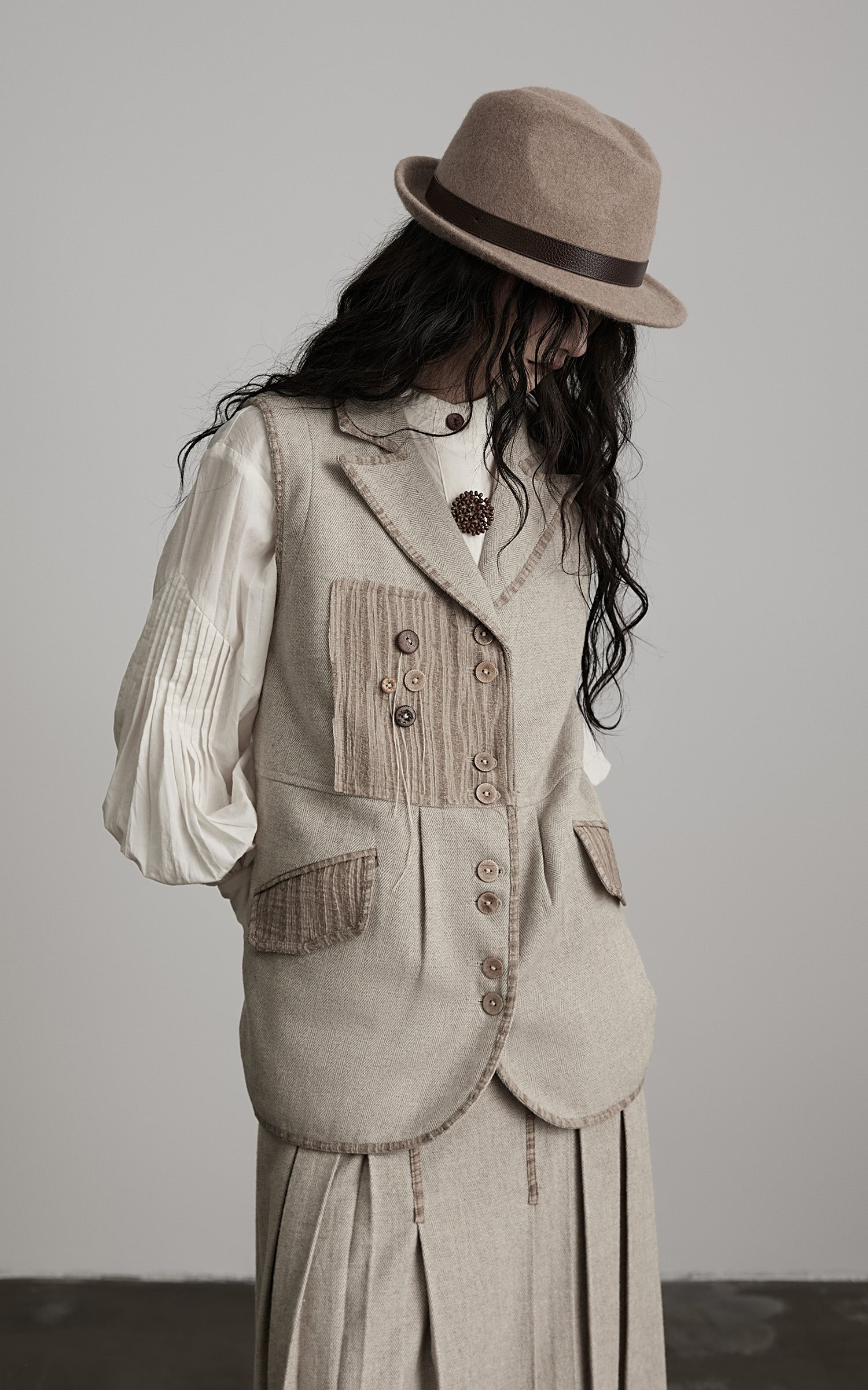 DOINDULGE Wool Patchwork Vest with Textured Panels