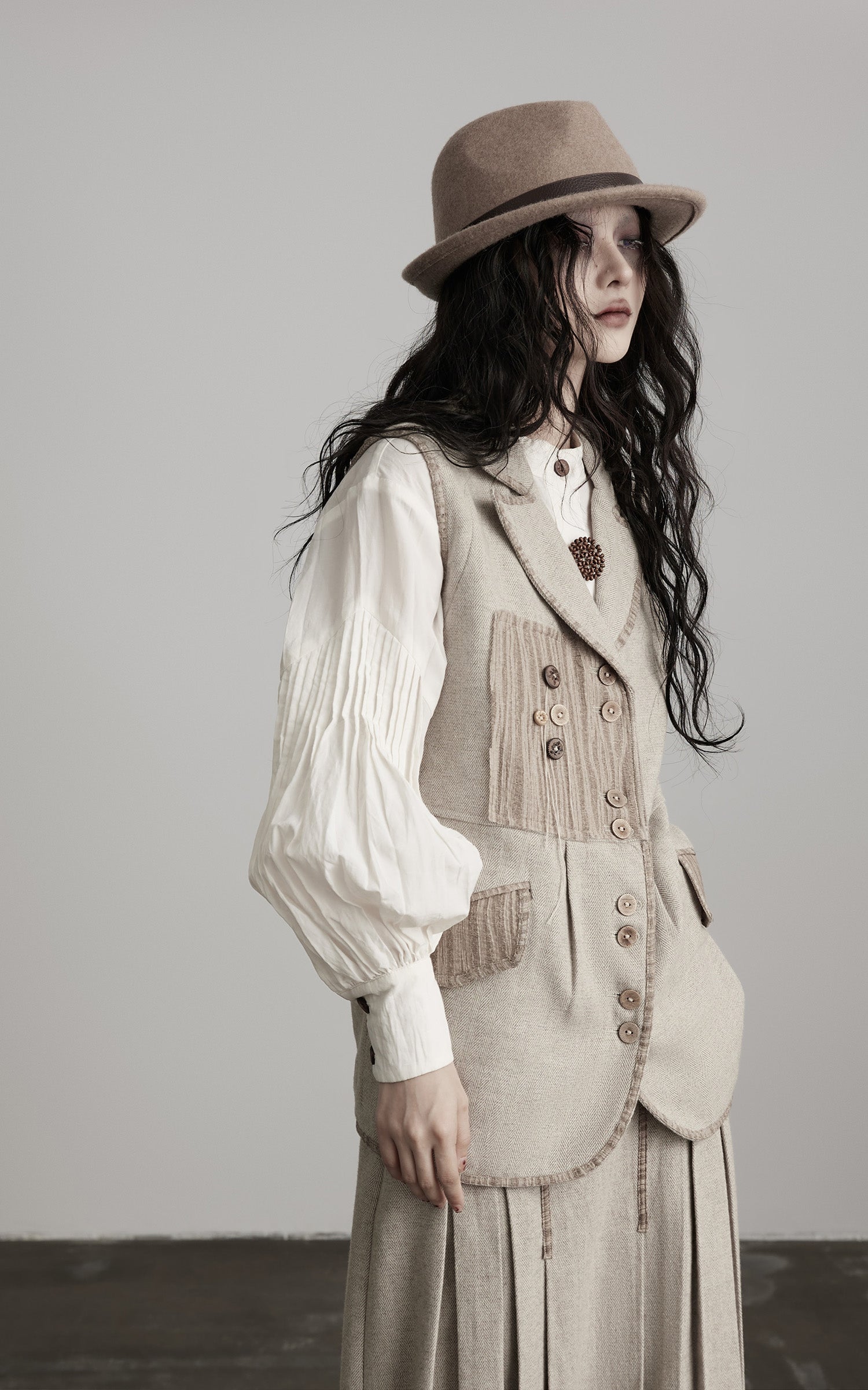 DOINDULGE Wool Patchwork Vest with Textured Panels