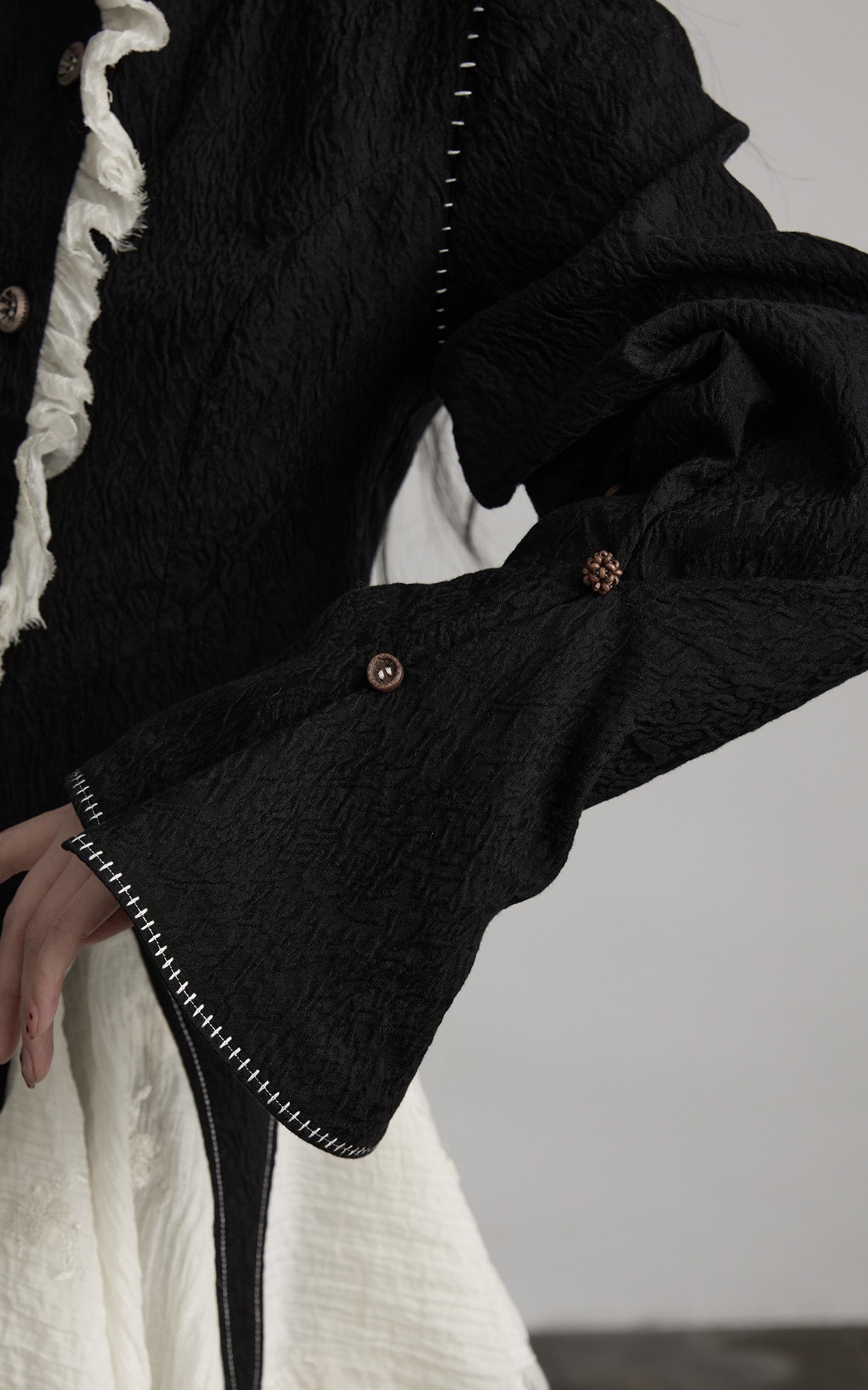 DOINDULGE Structured Crinkle Sculptural Peplum Jacket