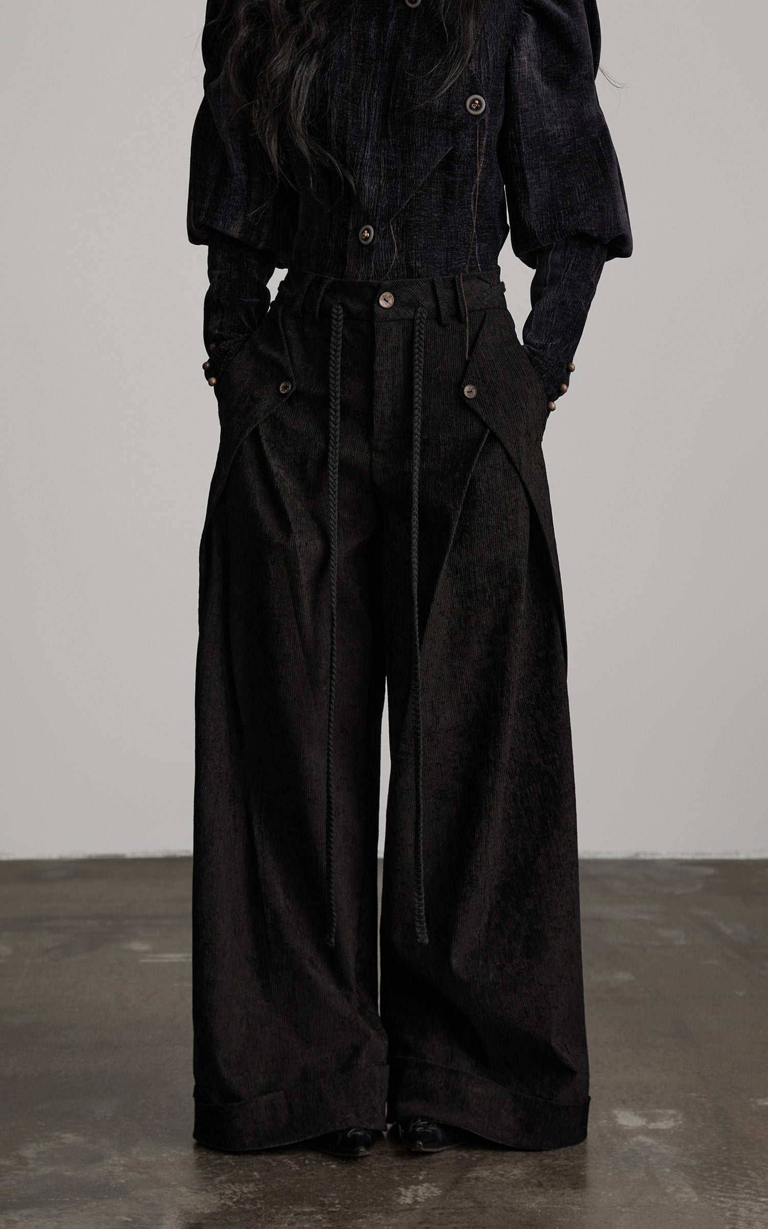 DOINDULGE Textured Wide-Leg Trousers with Draped Panels and Rope Detail