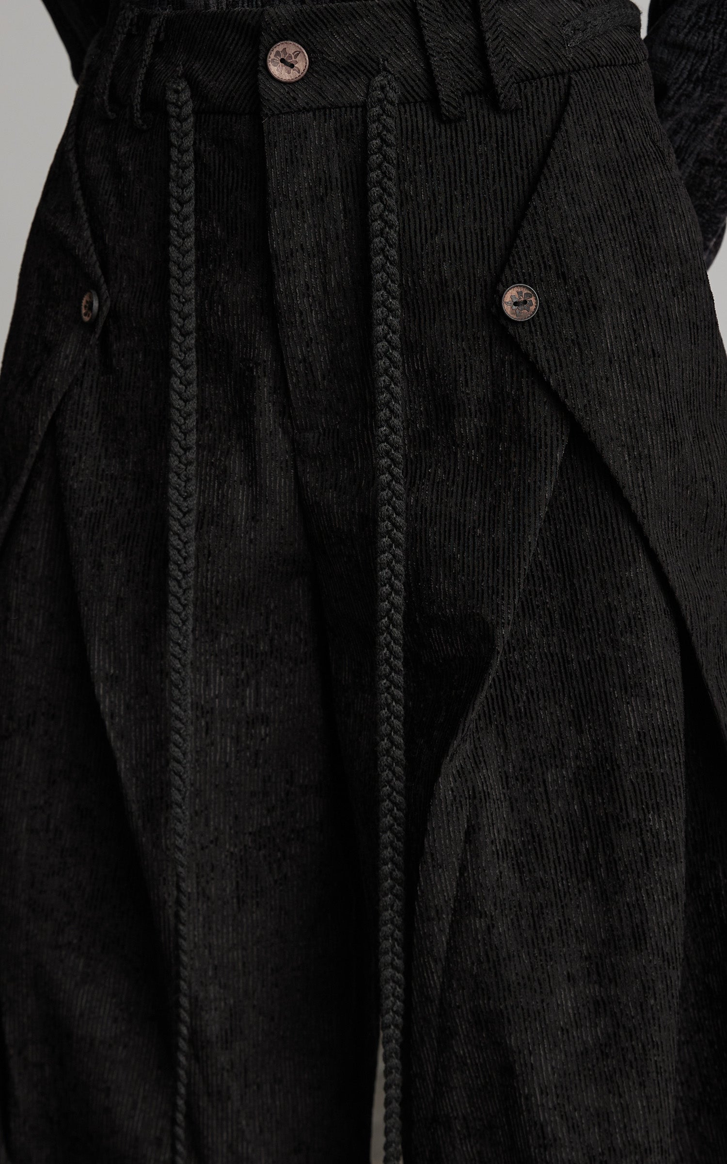 DOINDULGE Textured Wide-Leg Trousers with Draped Panels and Rope Detail