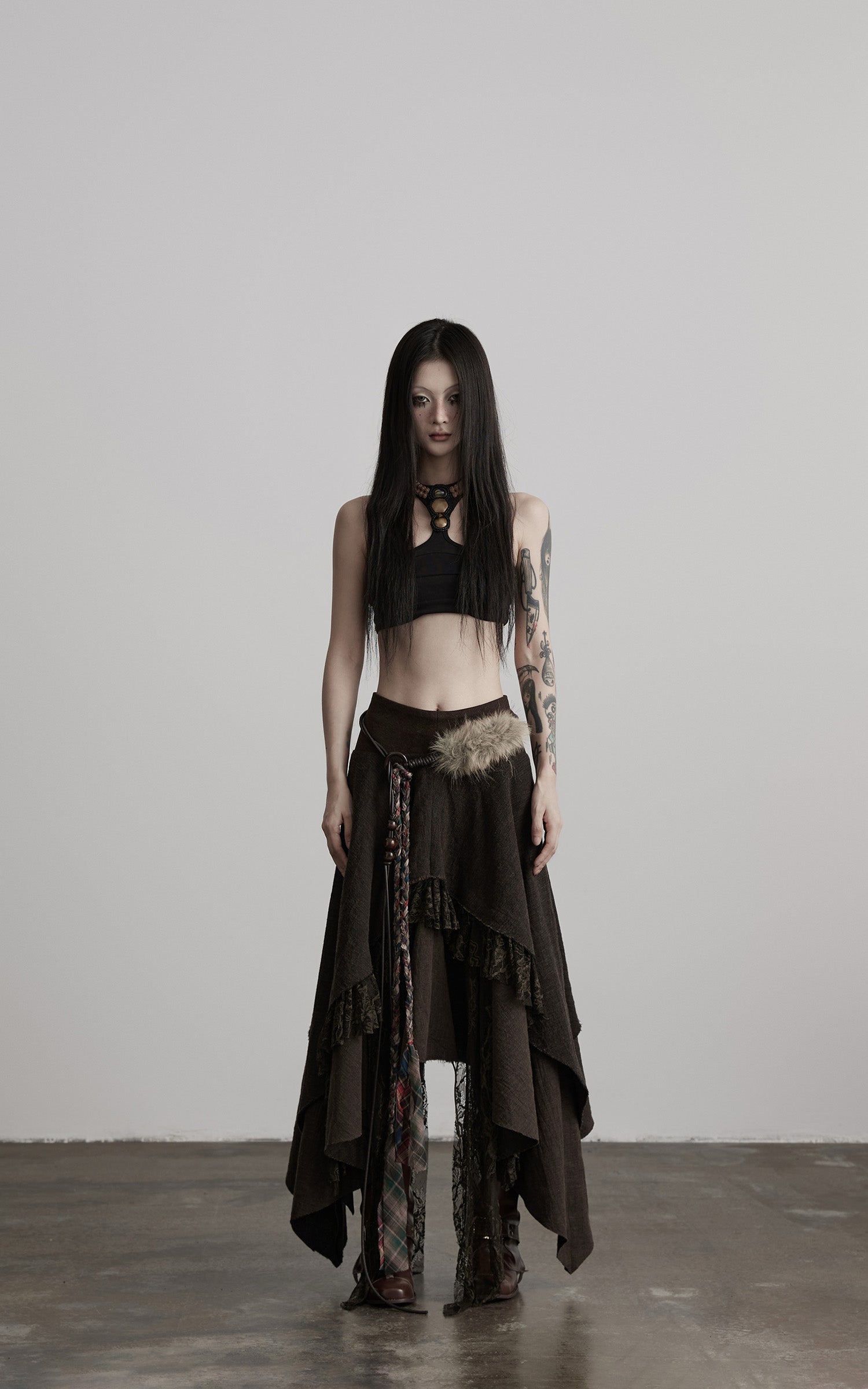 DOINDULGE Layered Asymmetric Skirt with Braided Belt and Fur Accent