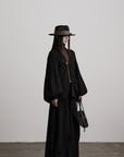 DOINDULGE Sculptural Cable-Knit Cardigan with Oversized Sleeves