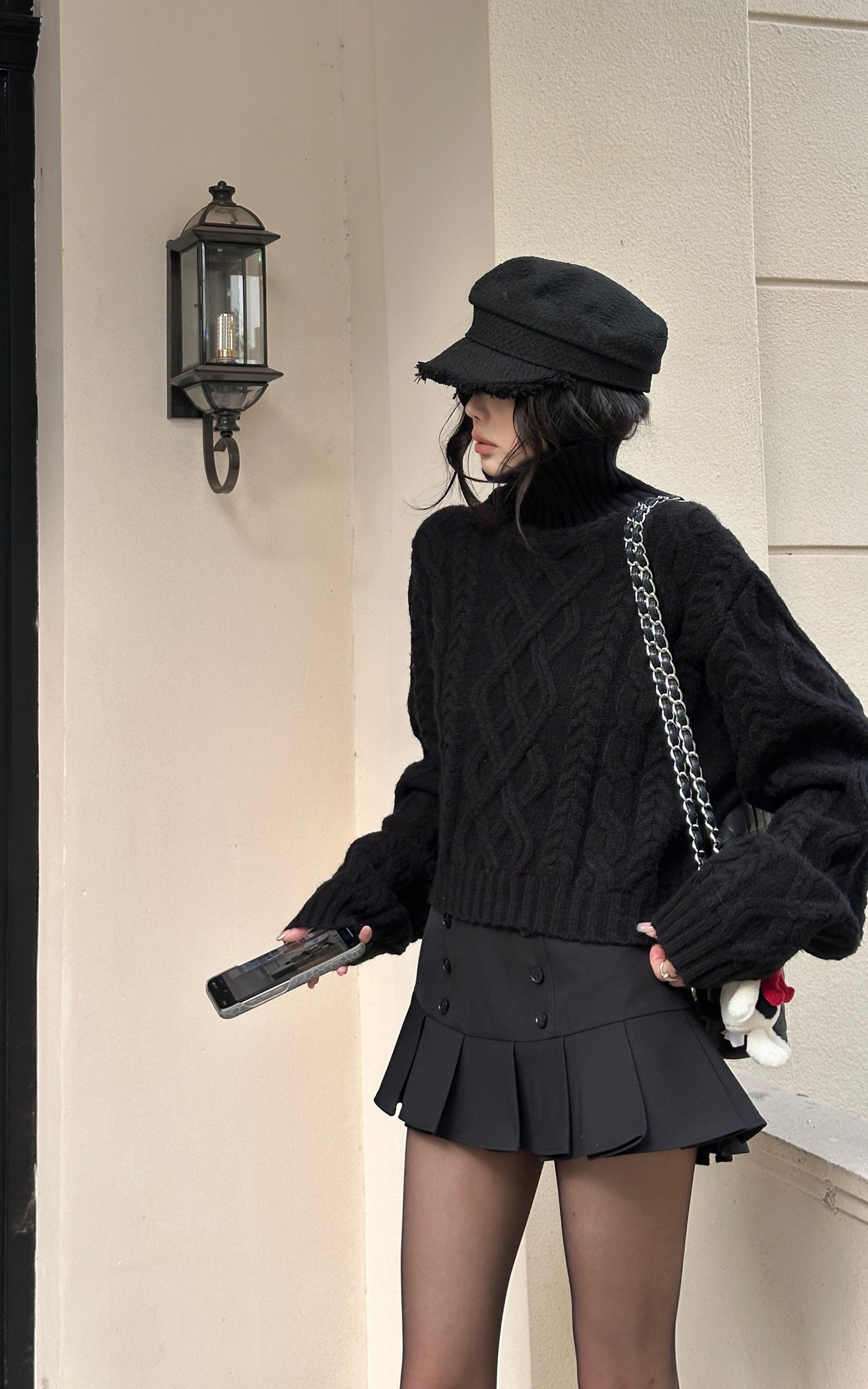 WARDEN EDGE Structured Pleated Mini Skirt with Double-Button Front