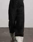 DOINDULGE Wide-Leg Textured Pants with Contrast Hem