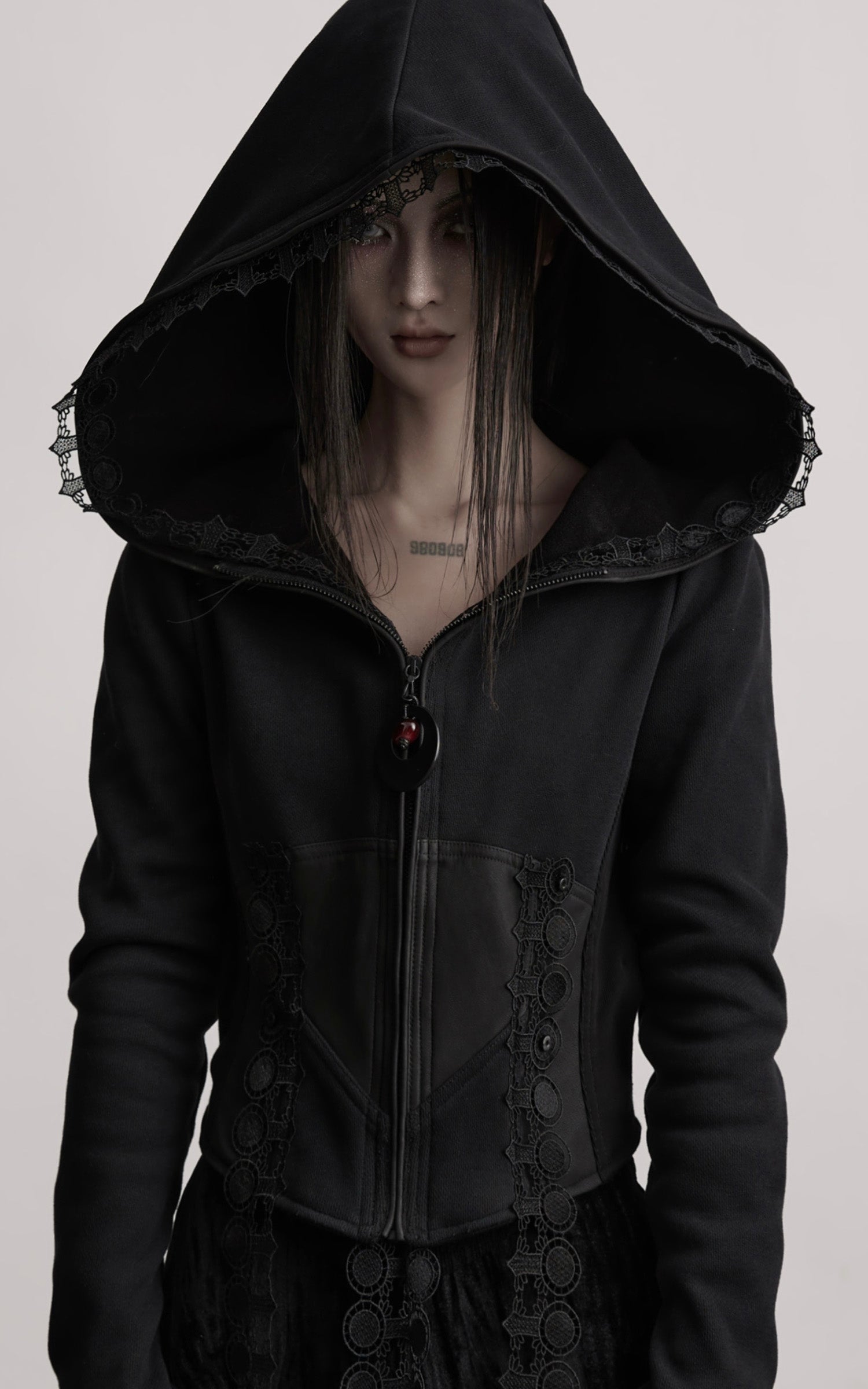 DOINDULGE Long-Hood Gothic Jacket with Lace Trim and Sculpted Corset Detail