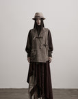 DOINDULGE Textured Wool Vest with Asymmetric Panels and Hand-Tied Toggle Details