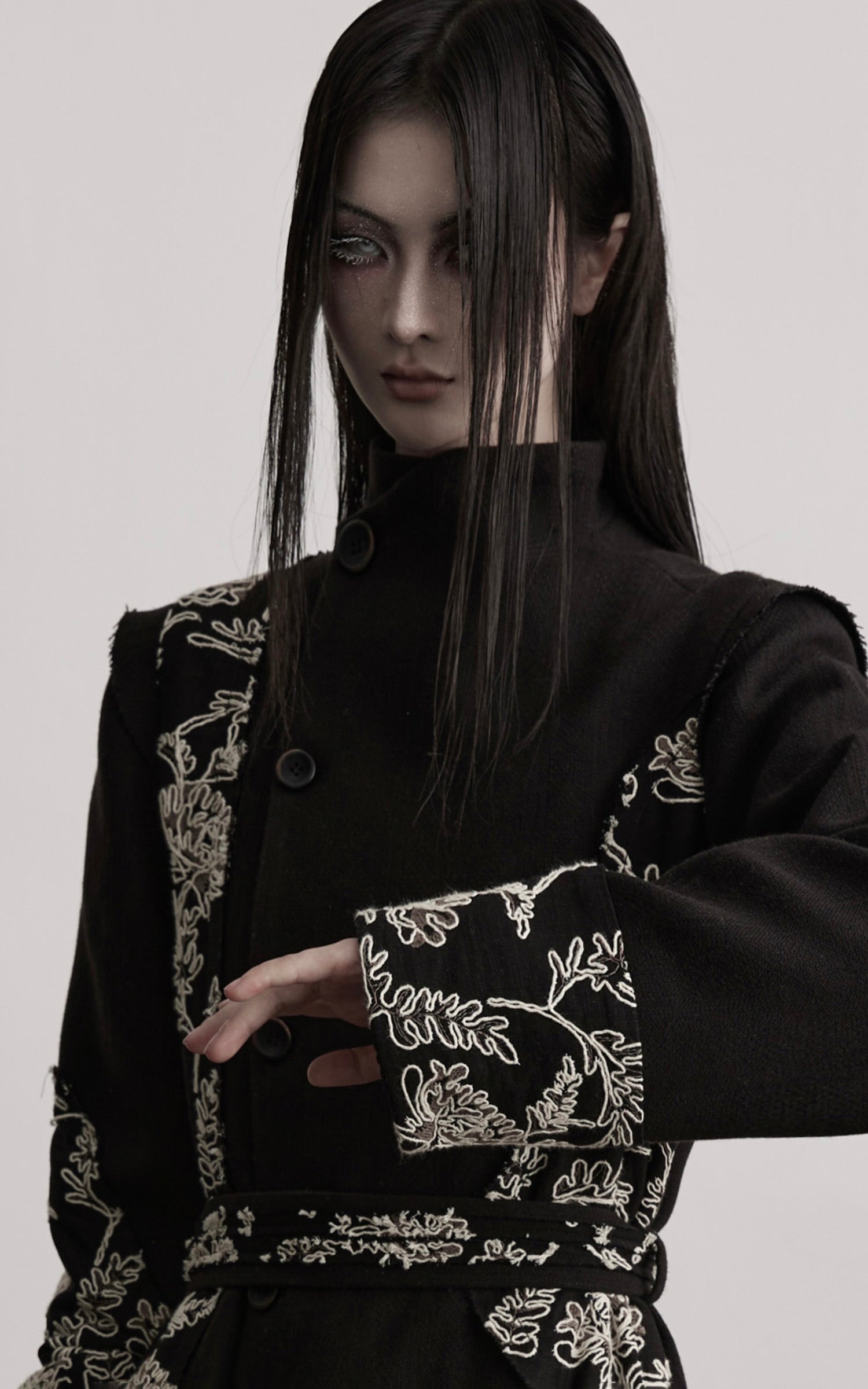 DOINDULGE Embroidered Asymmetric Long Coat