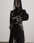 DOINDULGE Embroidered Asymmetric Long Coat