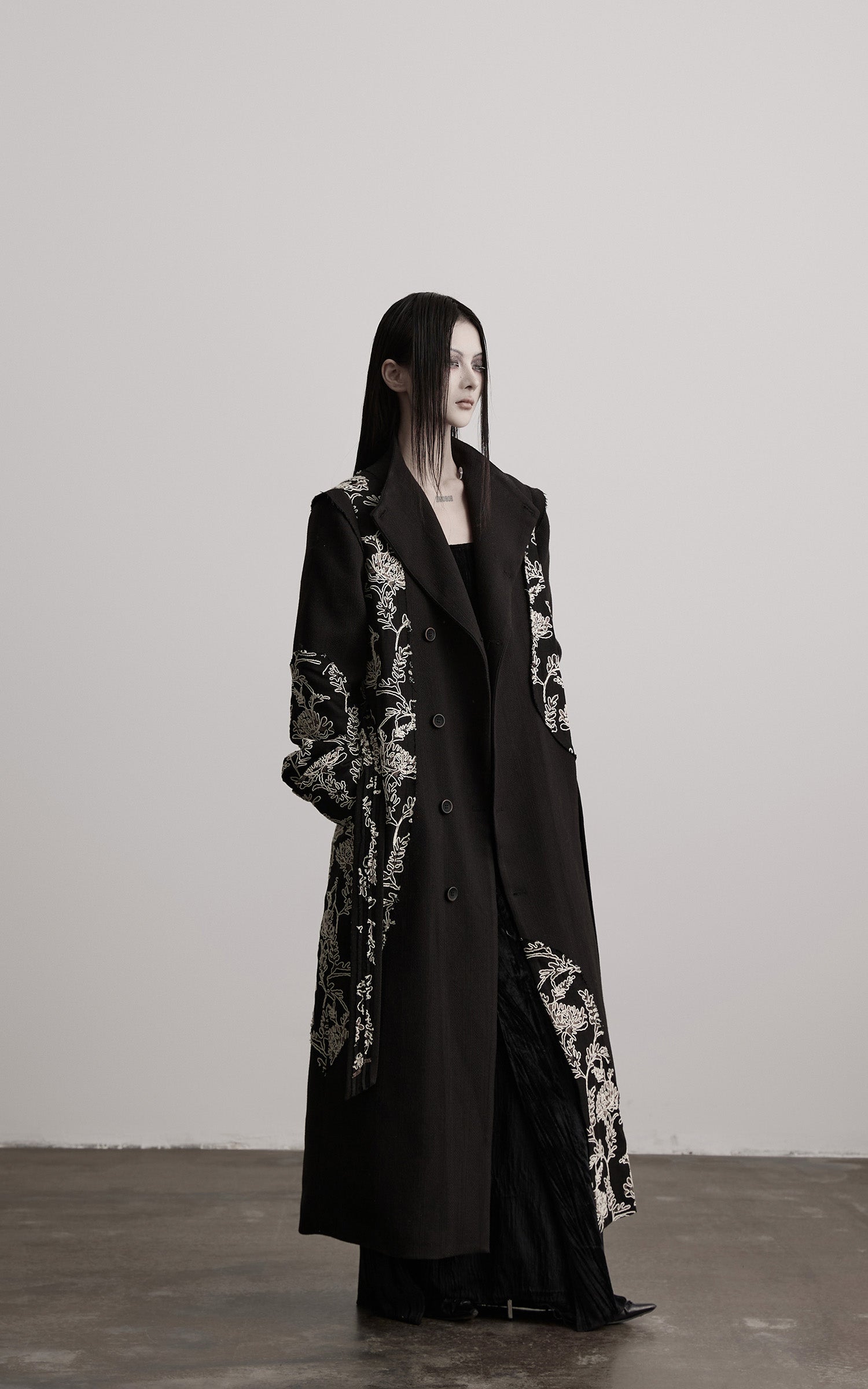 DOINDULGE Embroidered Asymmetric Long Coat