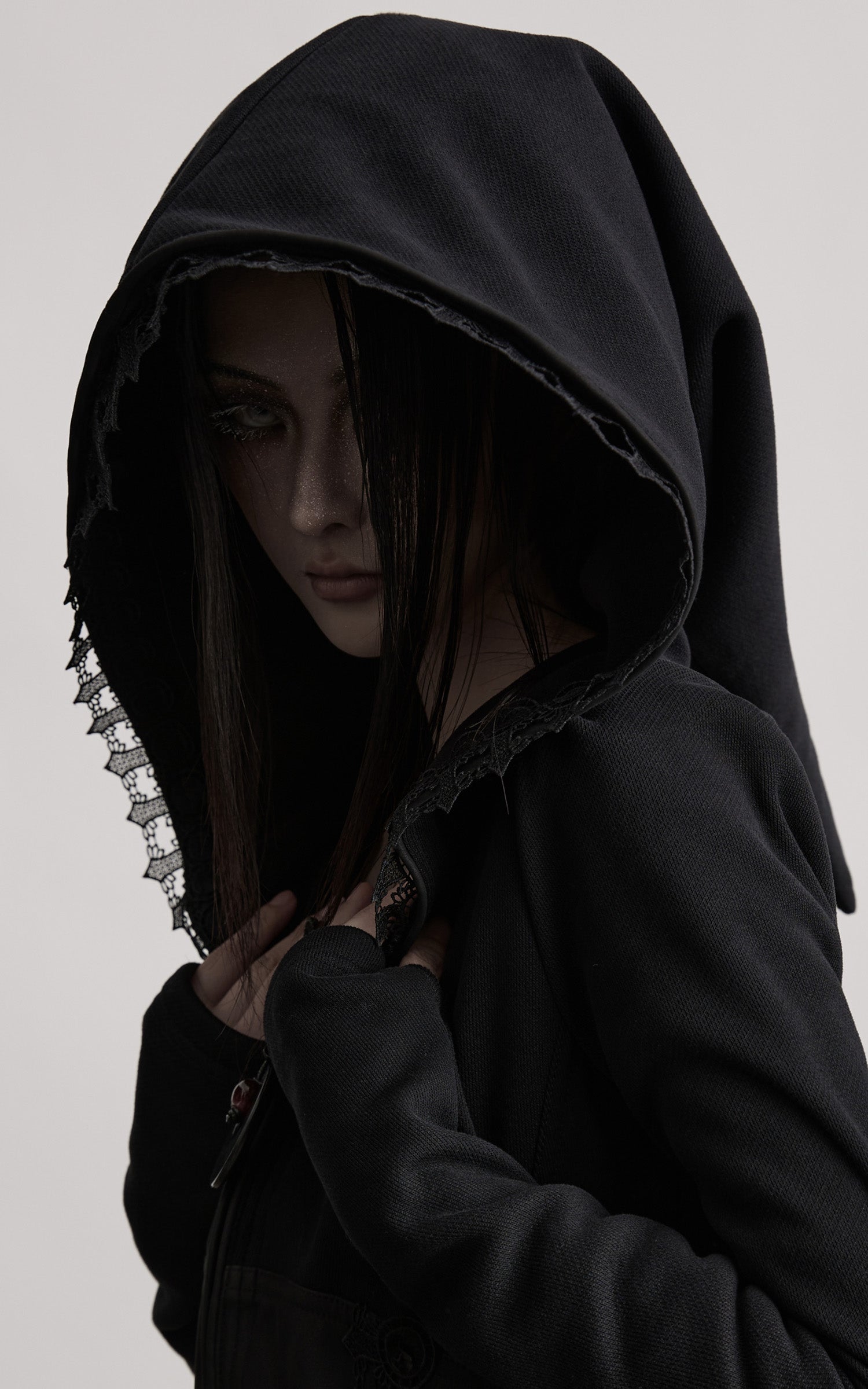 DOINDULGE Long-Hood Gothic Jacket with Lace Trim and Sculpted Corset Detail