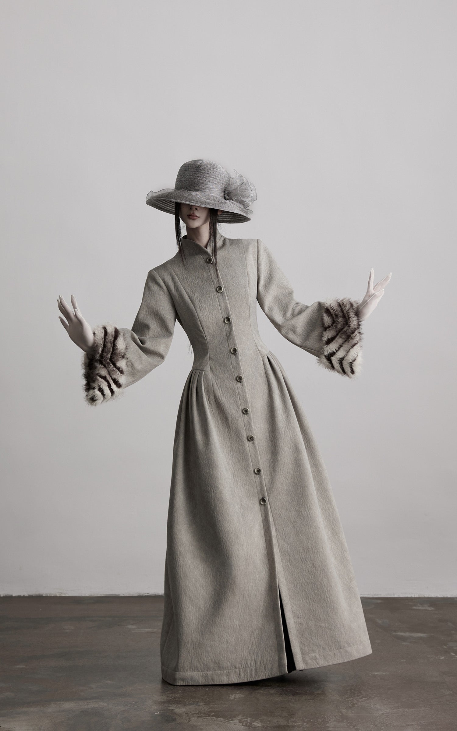 DOINDULGE Sculptural Long Coat with Faux-Fur Cuffs
