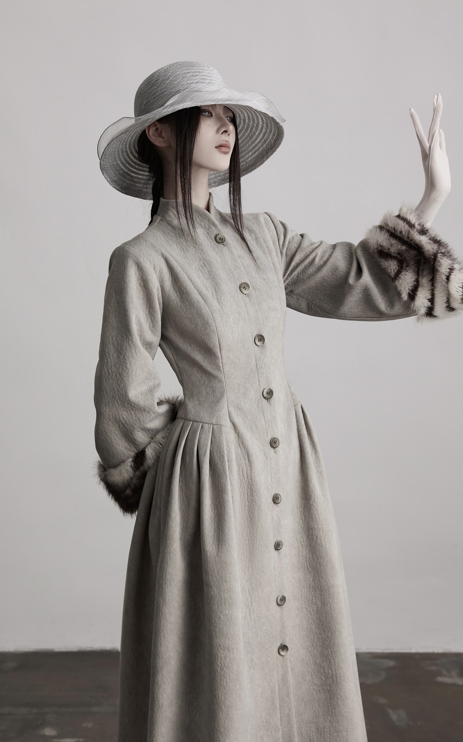 DOINDULGE Sculptural Long Coat with Faux-Fur Cuffs