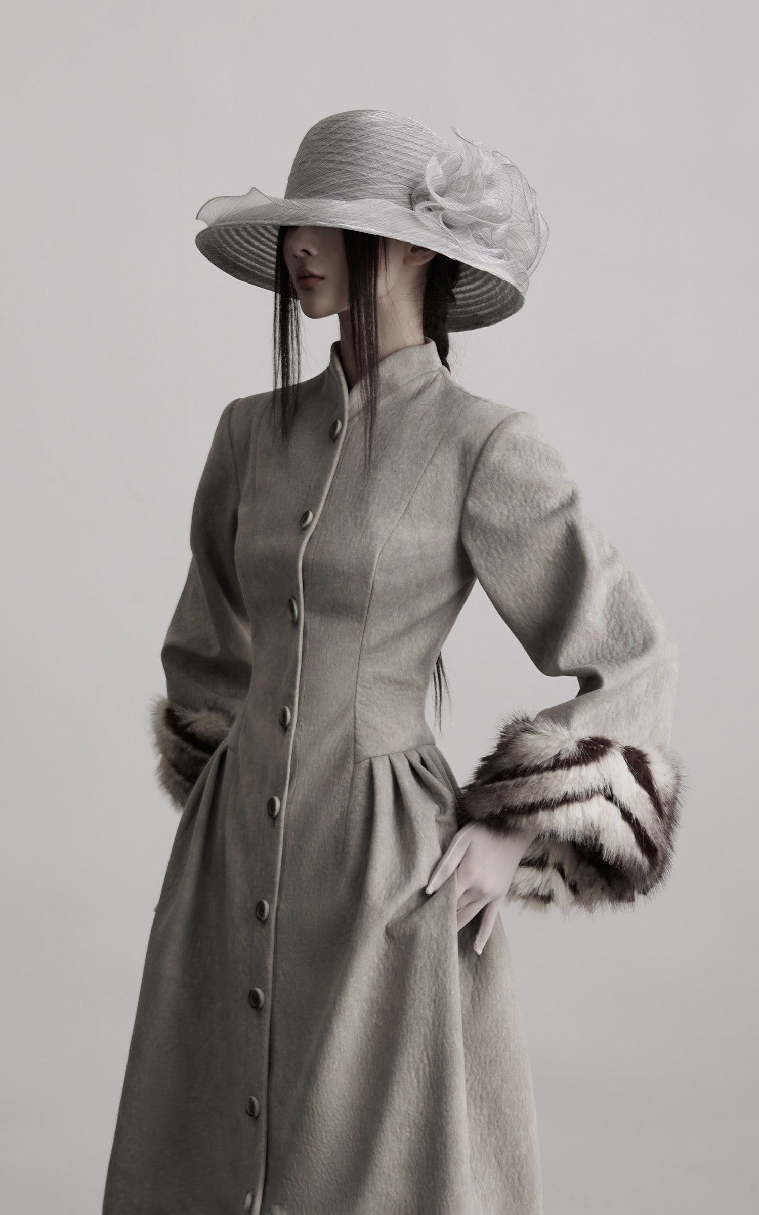 DOINDULGE Sculptural Long Coat with Faux-Fur Cuffs