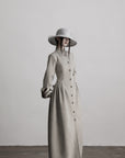 DOINDULGE Sculptural Long Coat with Faux-Fur Cuffs