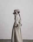 DOINDULGE Sculptural Long Coat with Faux-Fur Cuffs