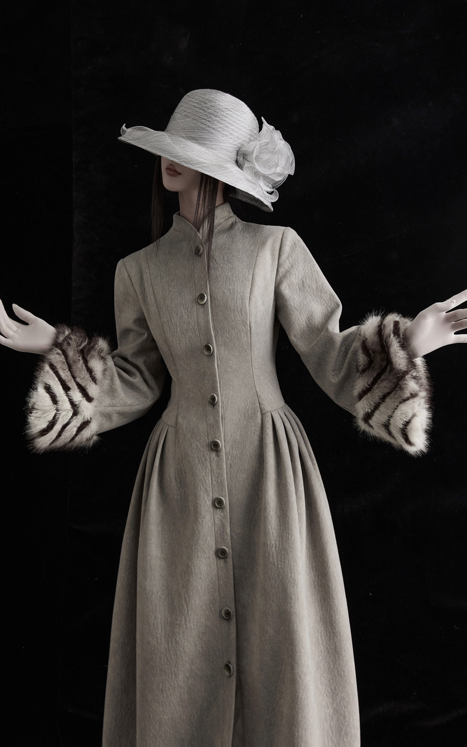 DOINDULGE Sculptural Long Coat with Faux-Fur Cuffs