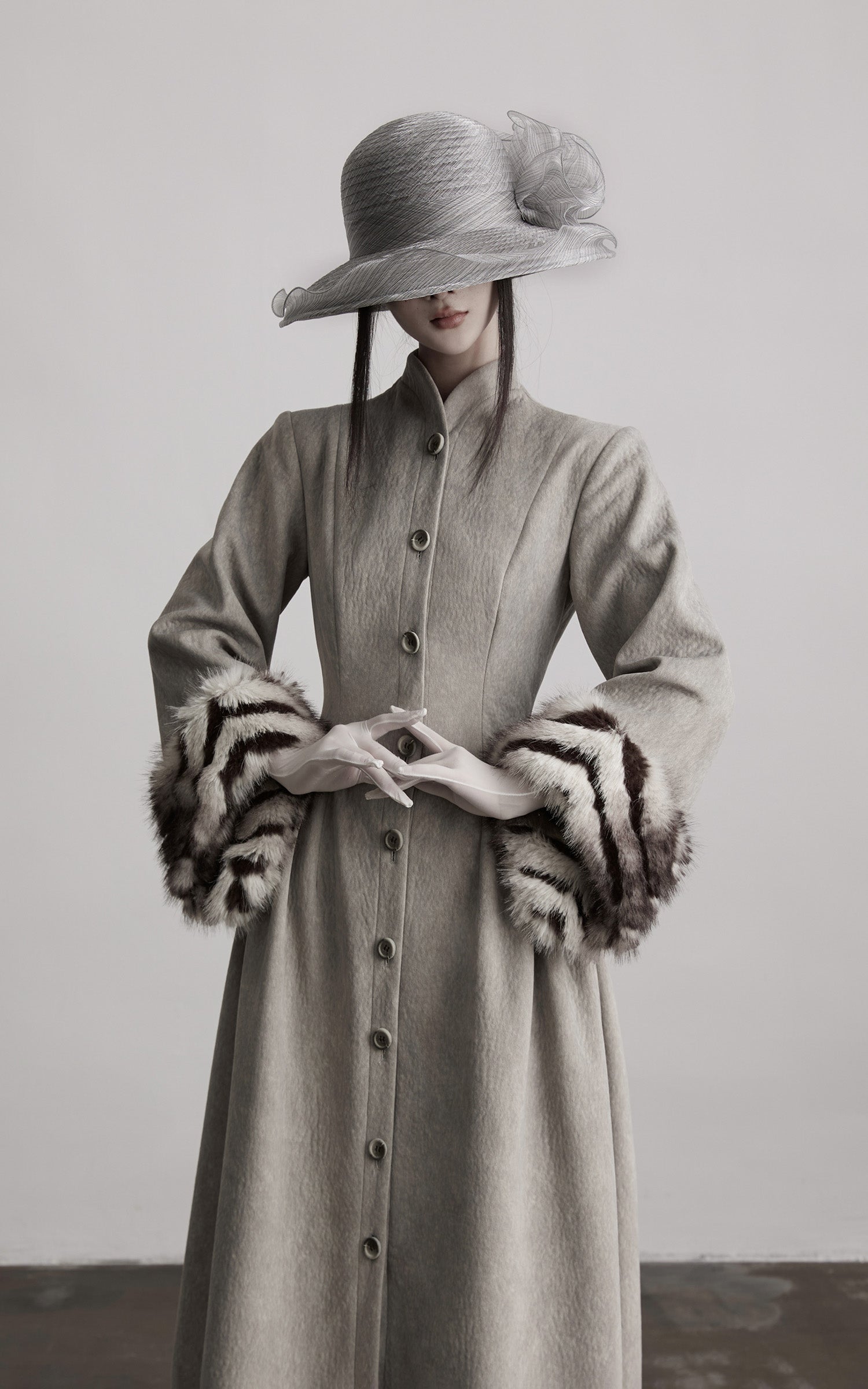 DOINDULGE Sculptural Long Coat with Faux-Fur Cuffs