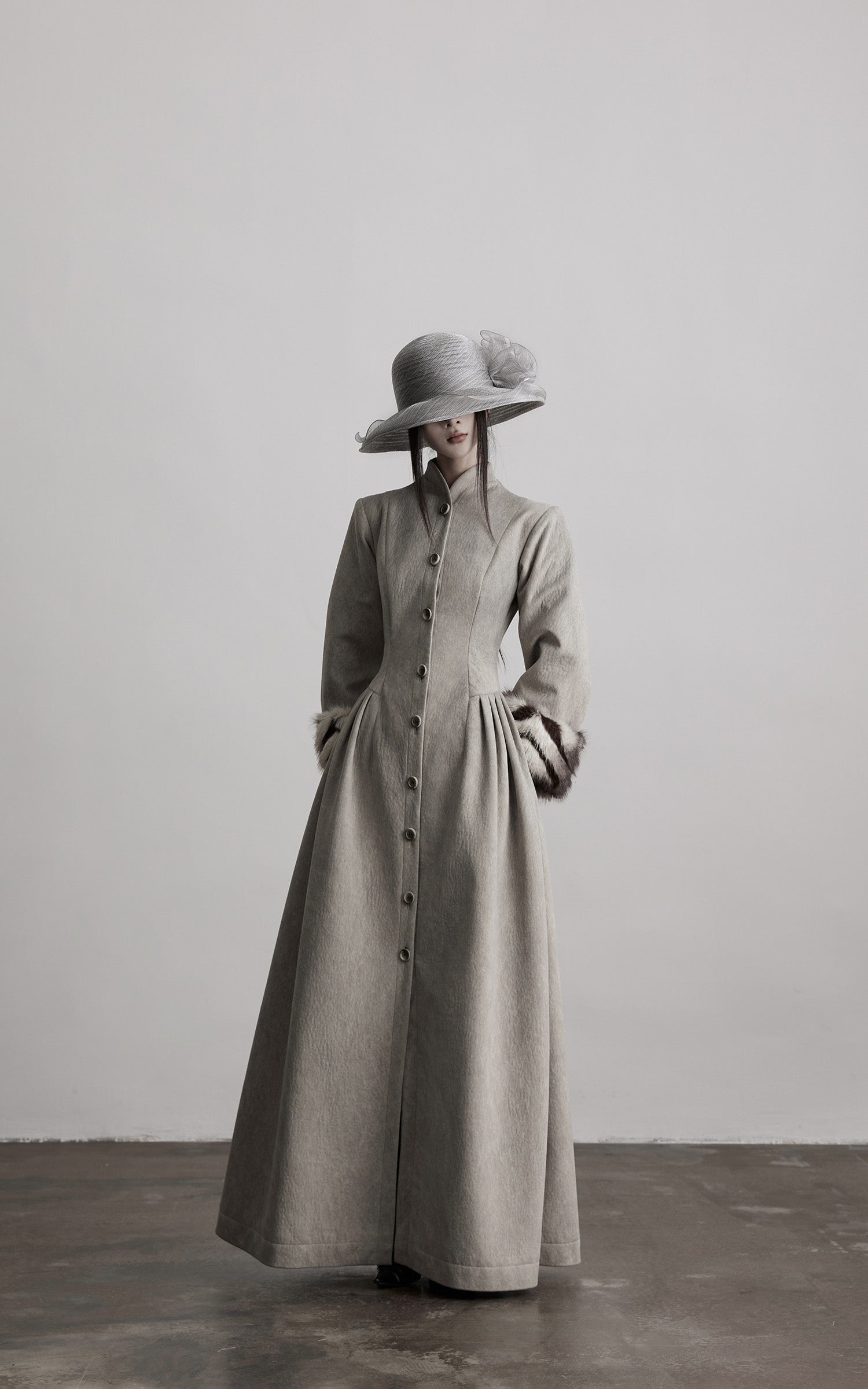 DOINDULGE Sculptural Long Coat with Faux-Fur Cuffs