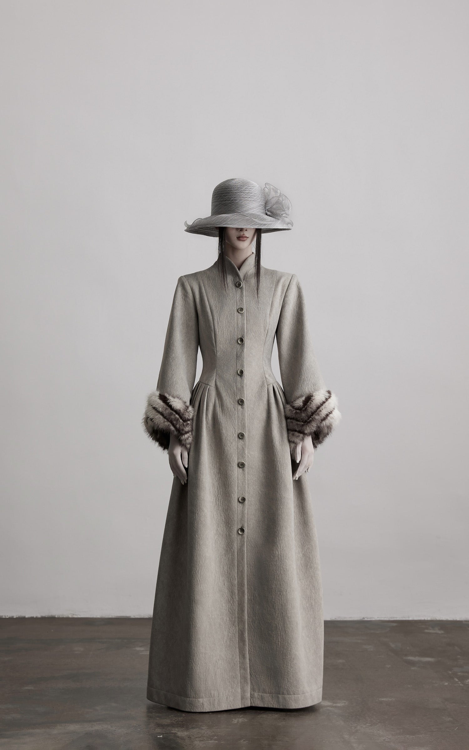 DOINDULGE Sculptural Long Coat with Faux-Fur Cuffs