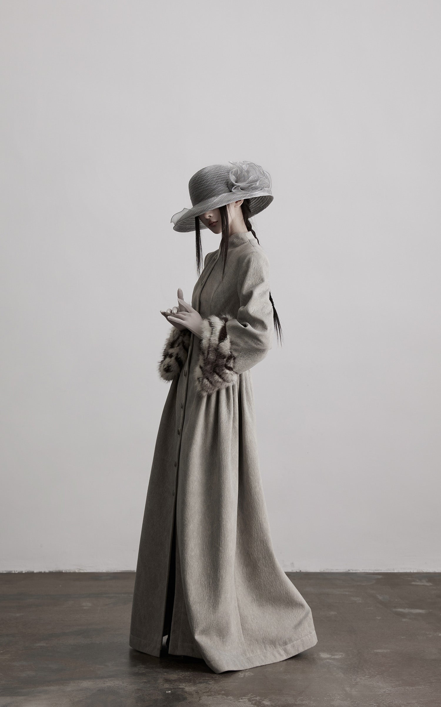 DOINDULGE Sculptural Long Coat with Faux-Fur Cuffs