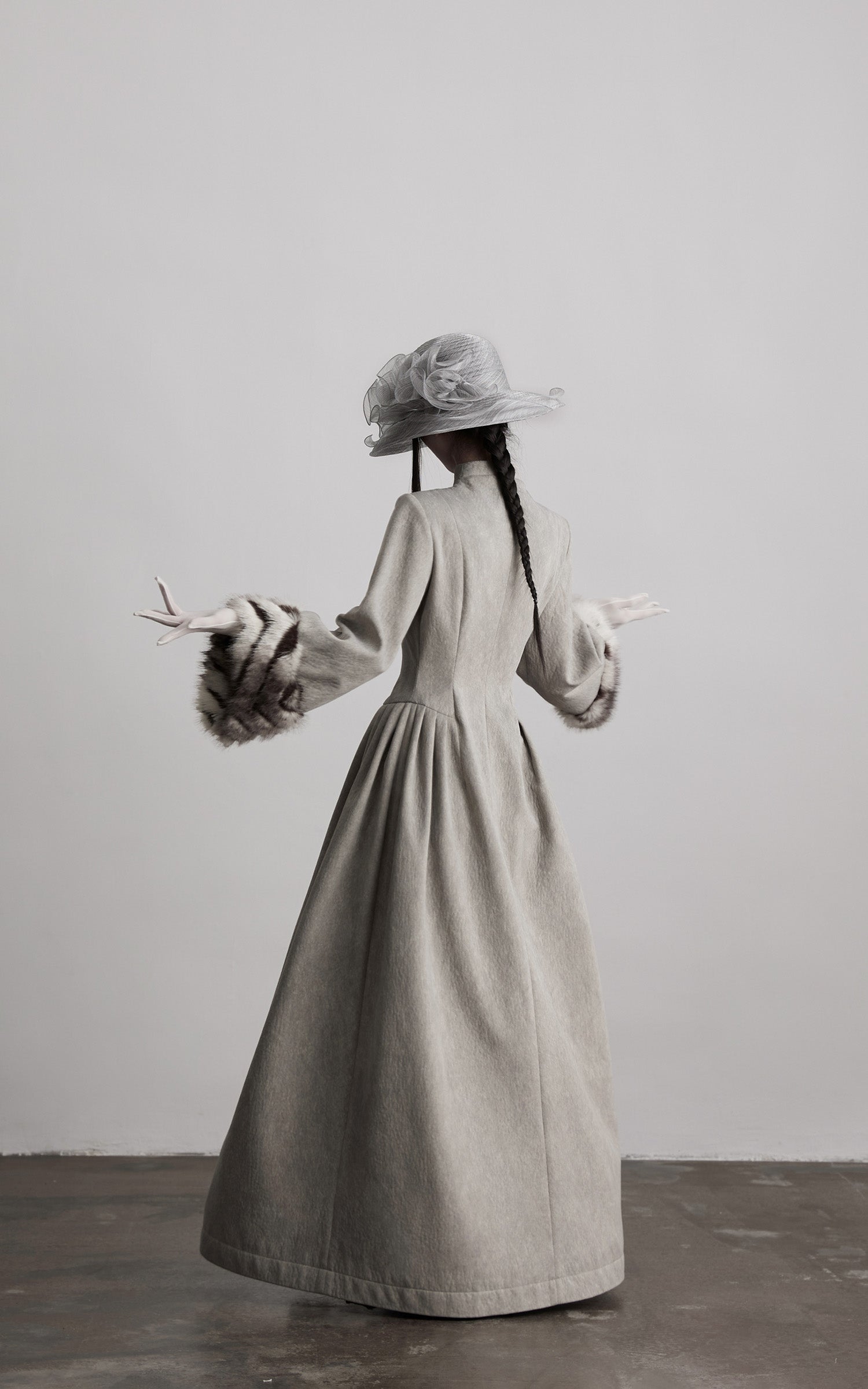 DOINDULGE Sculptural Long Coat with Faux-Fur Cuffs