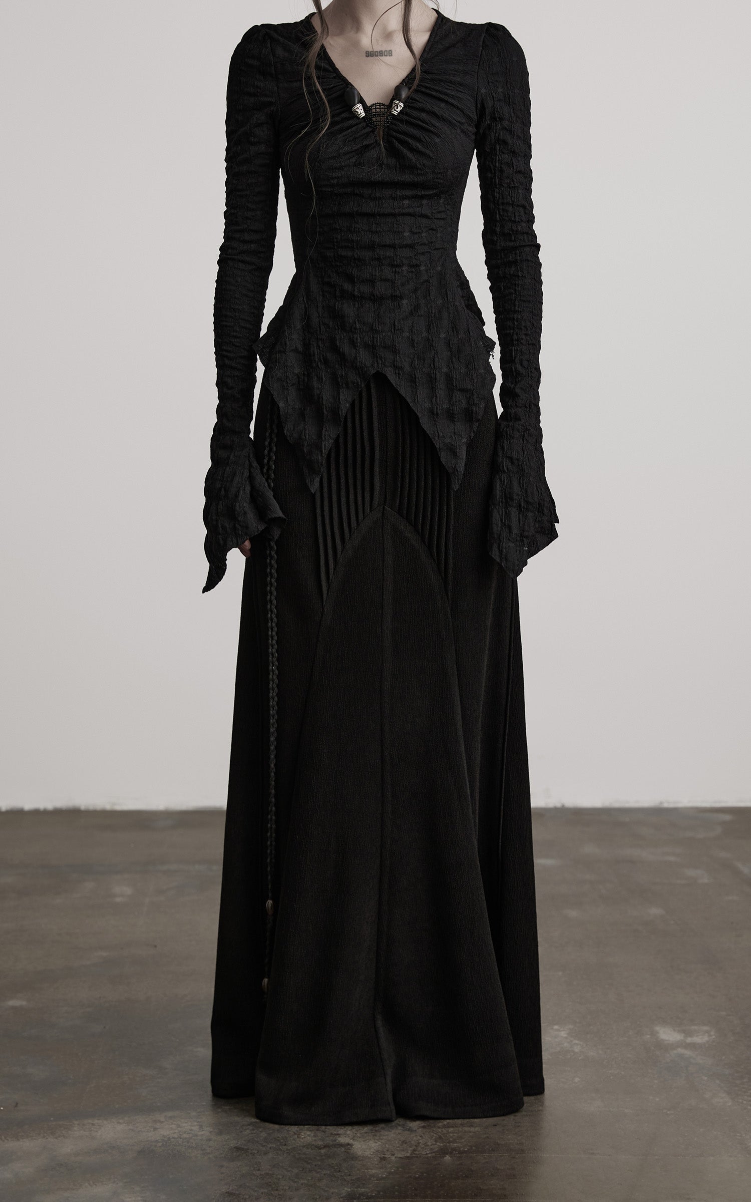 DOINDULGE Asymmetrical Pleated Long Skirt