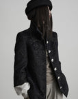 DOINDULGE High-Neck Textured Jacket with Crescent Button Detail