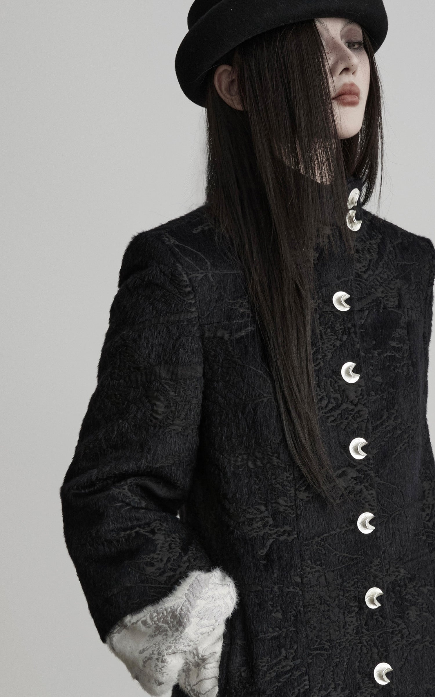 DOINDULGE High-Neck Textured Jacket with Crescent Button Detail