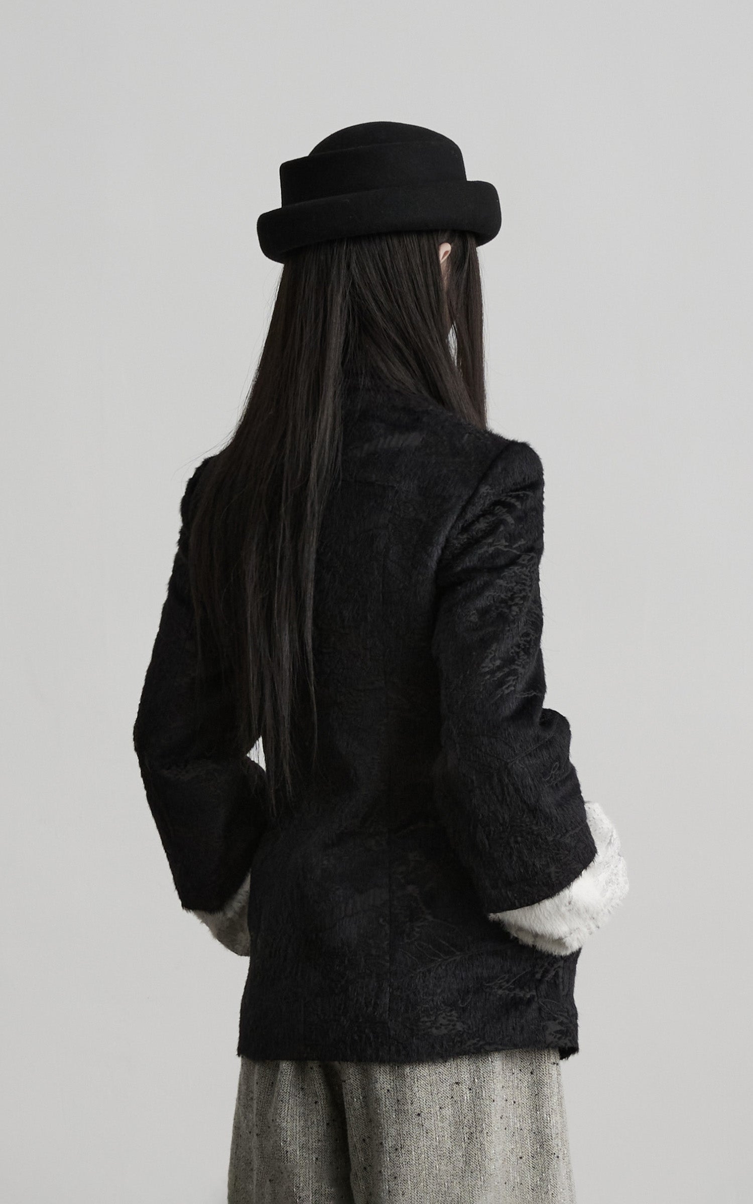 DOINDULGE High-Neck Textured Jacket with Crescent Button Detail