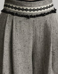 DOINDULGE Pleated Wide-Leg Trousers
