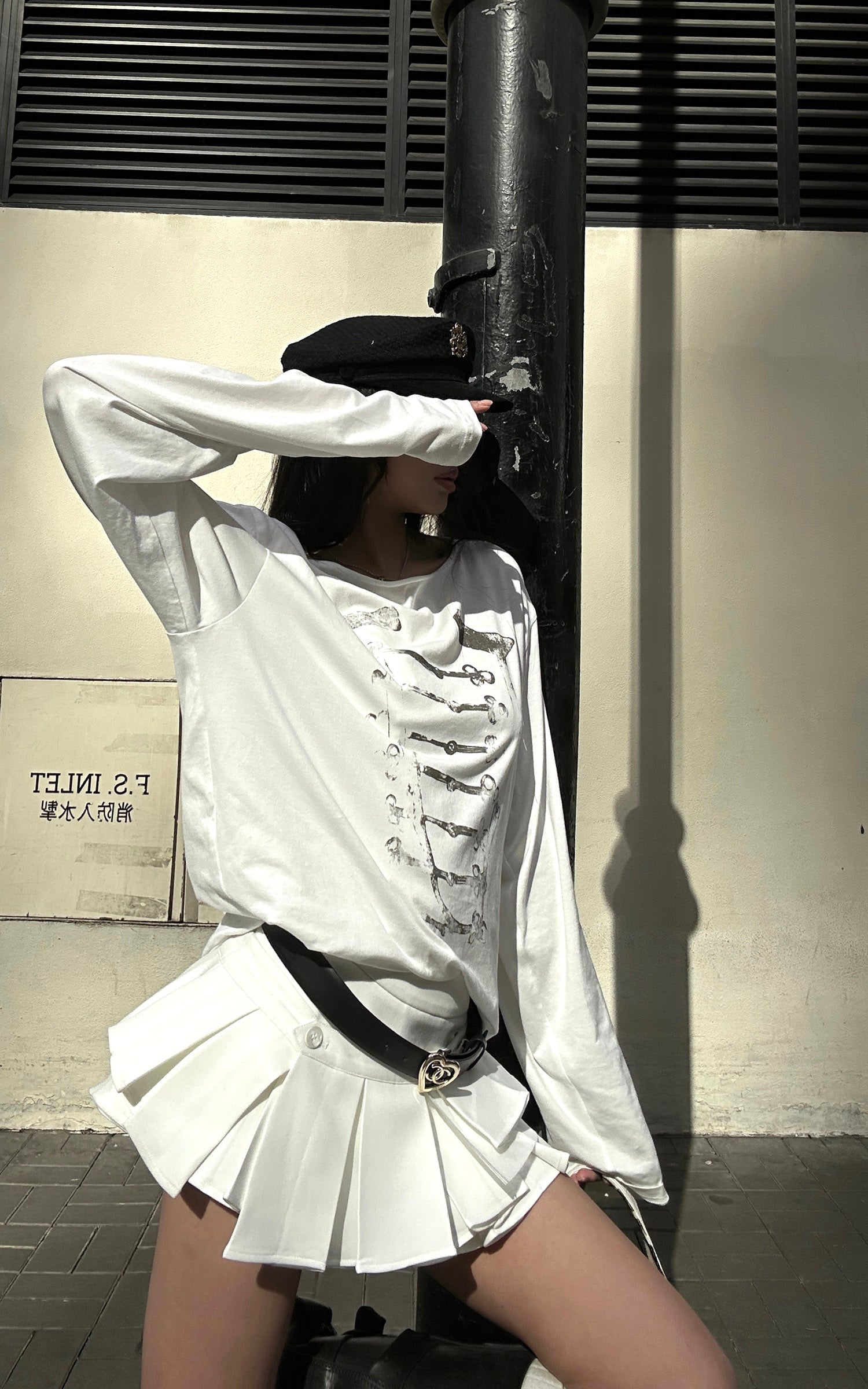 WARDEN EDGE Low-Rise Layered Pleated Mini Skirt