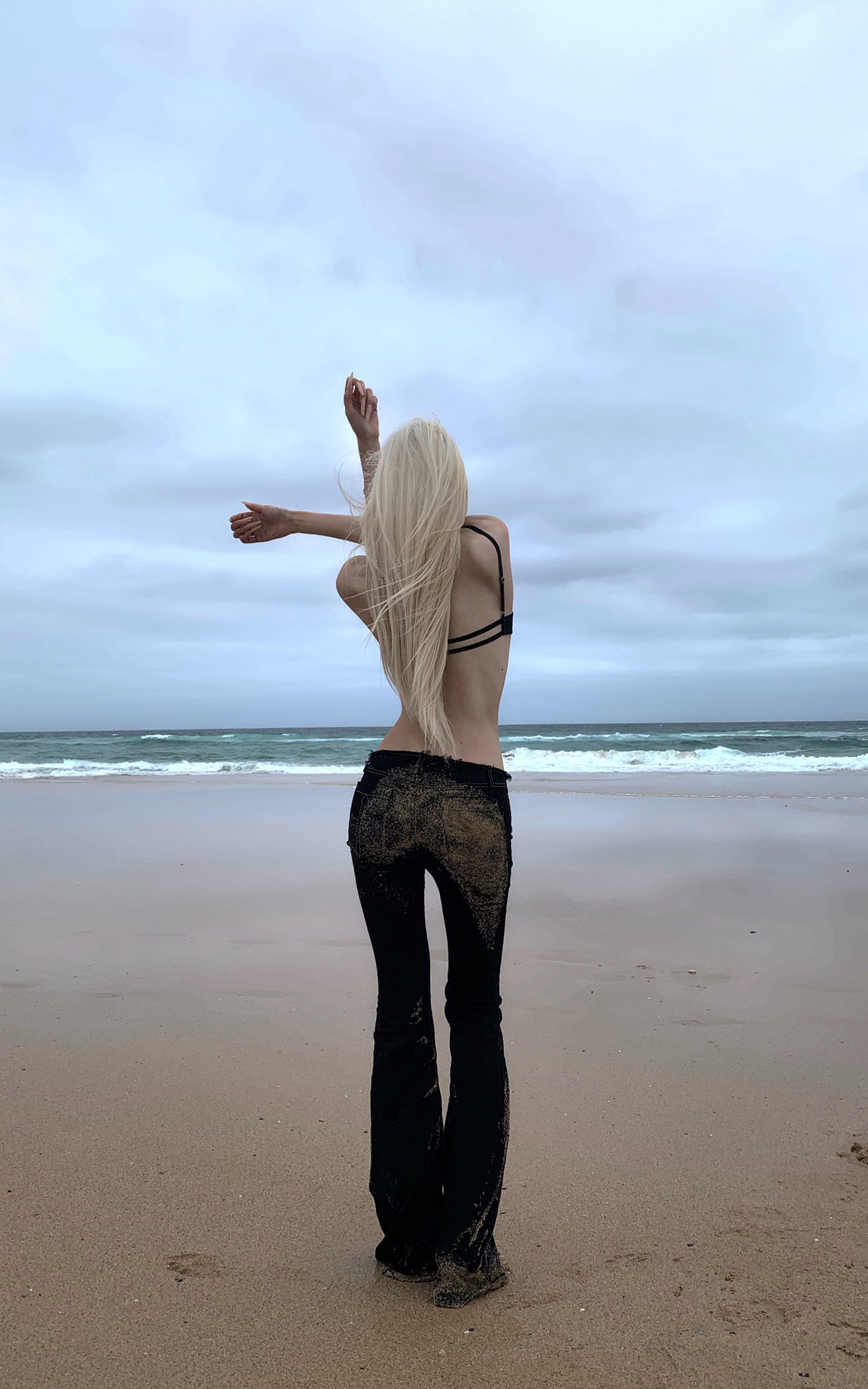 Rase le sol Pantalon en jean évasé à bords bruts
