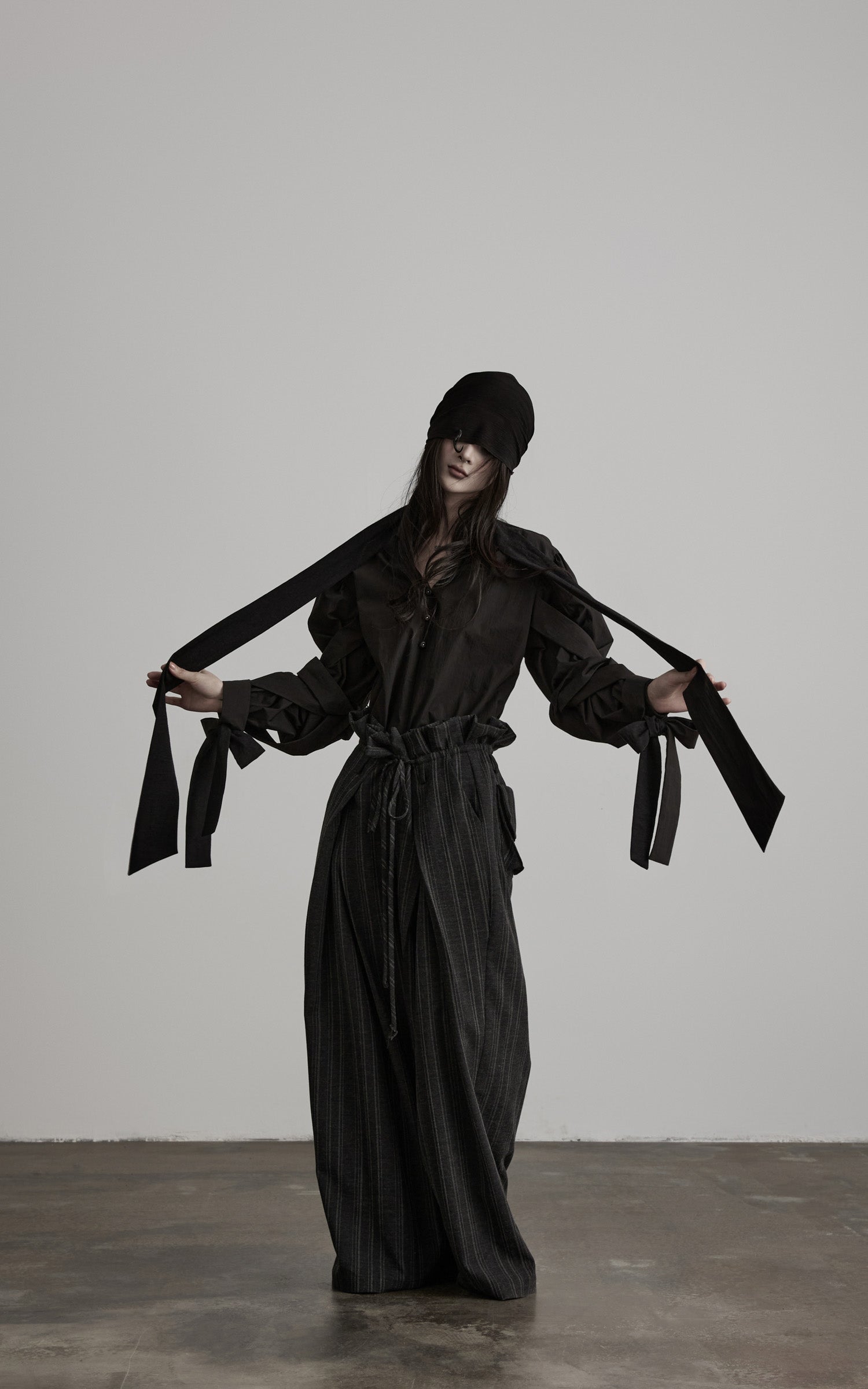 DOINDULGE Sculptural Ribbon Sleeve High Neck Shirt