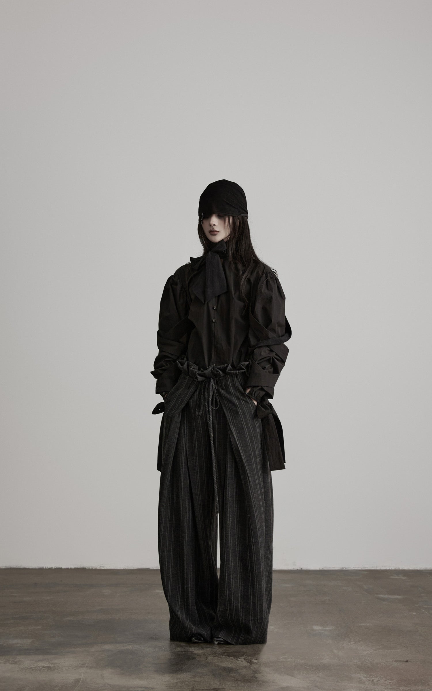 DOINDULGE Sculptural Ribbon Sleeve High Neck Shirt