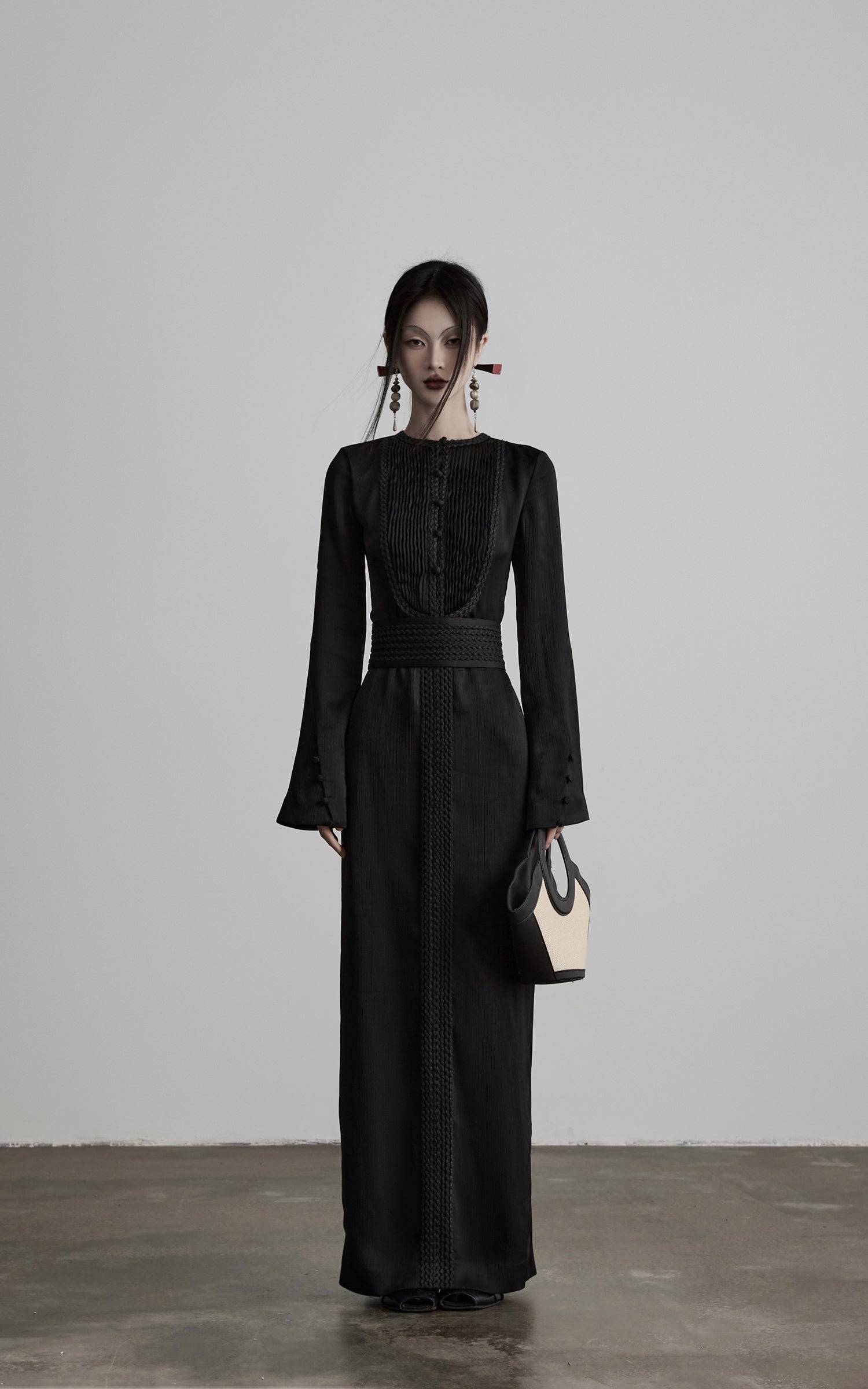 DOINDULGE Pleated Panel Braided Waist Long Sleeve Sculptural Maxi Dress