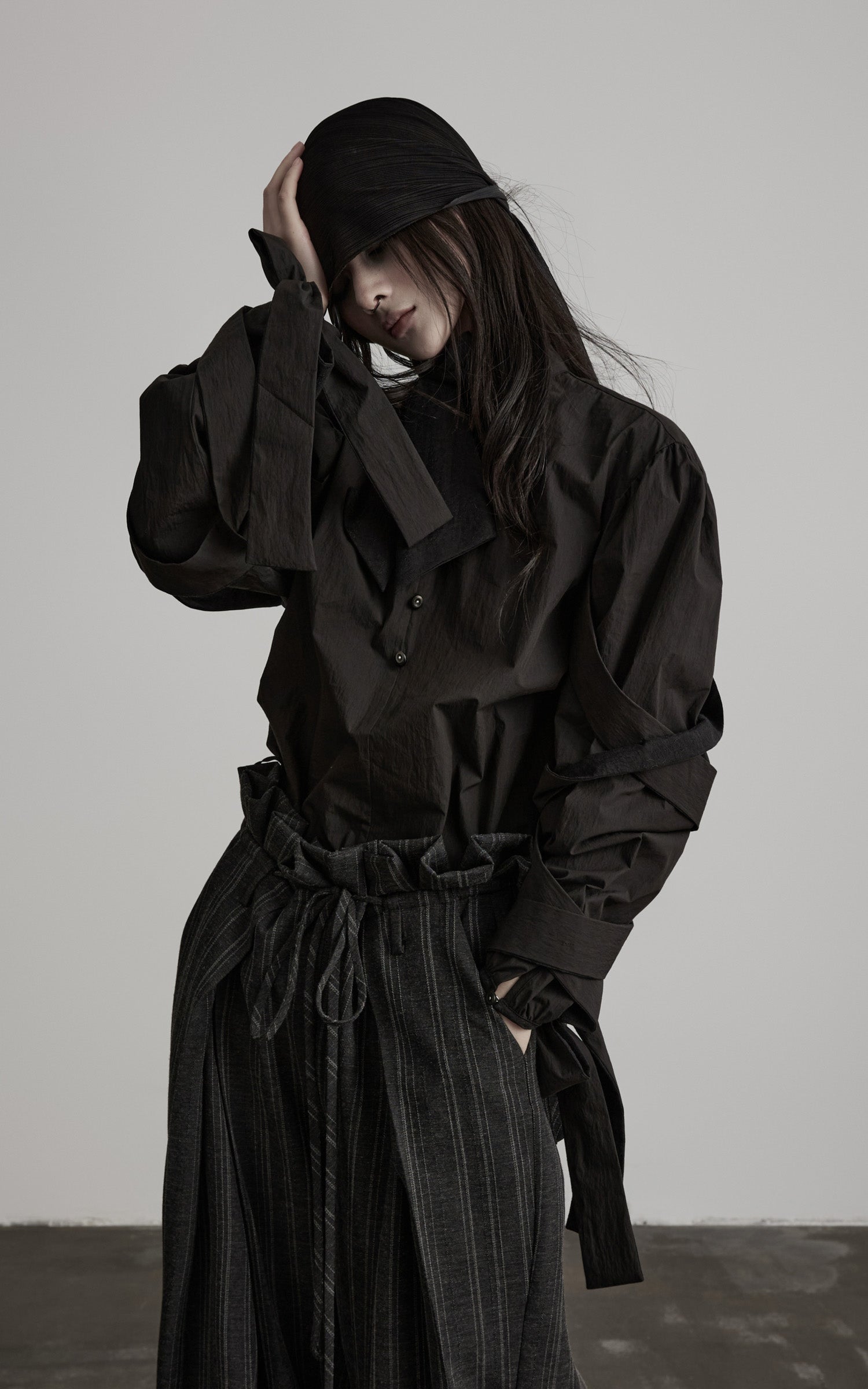 DOINDULGE Sculptural Ribbon Sleeve High Neck Shirt