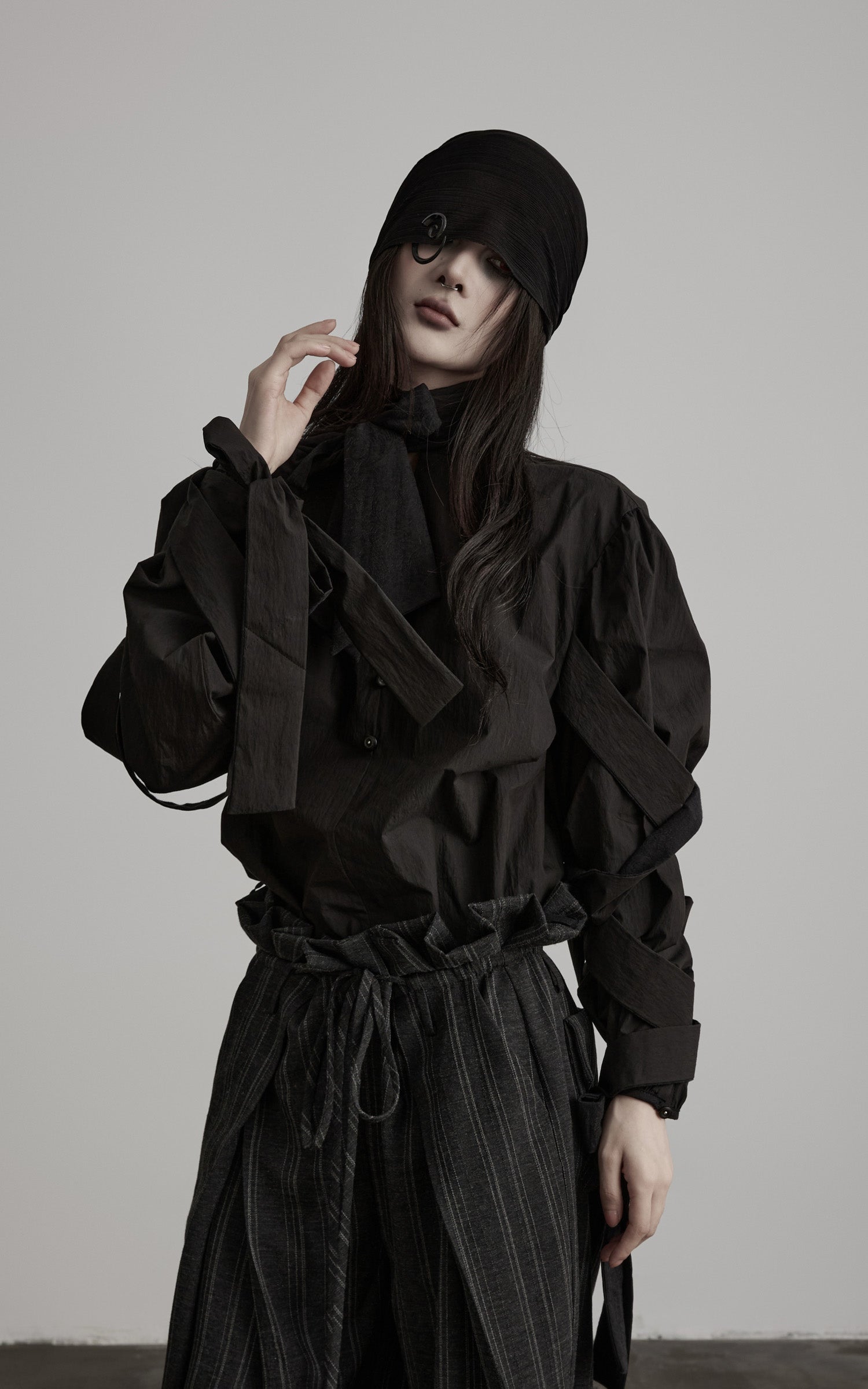 DOINDULGE Sculptural Ribbon Sleeve High Neck Shirt