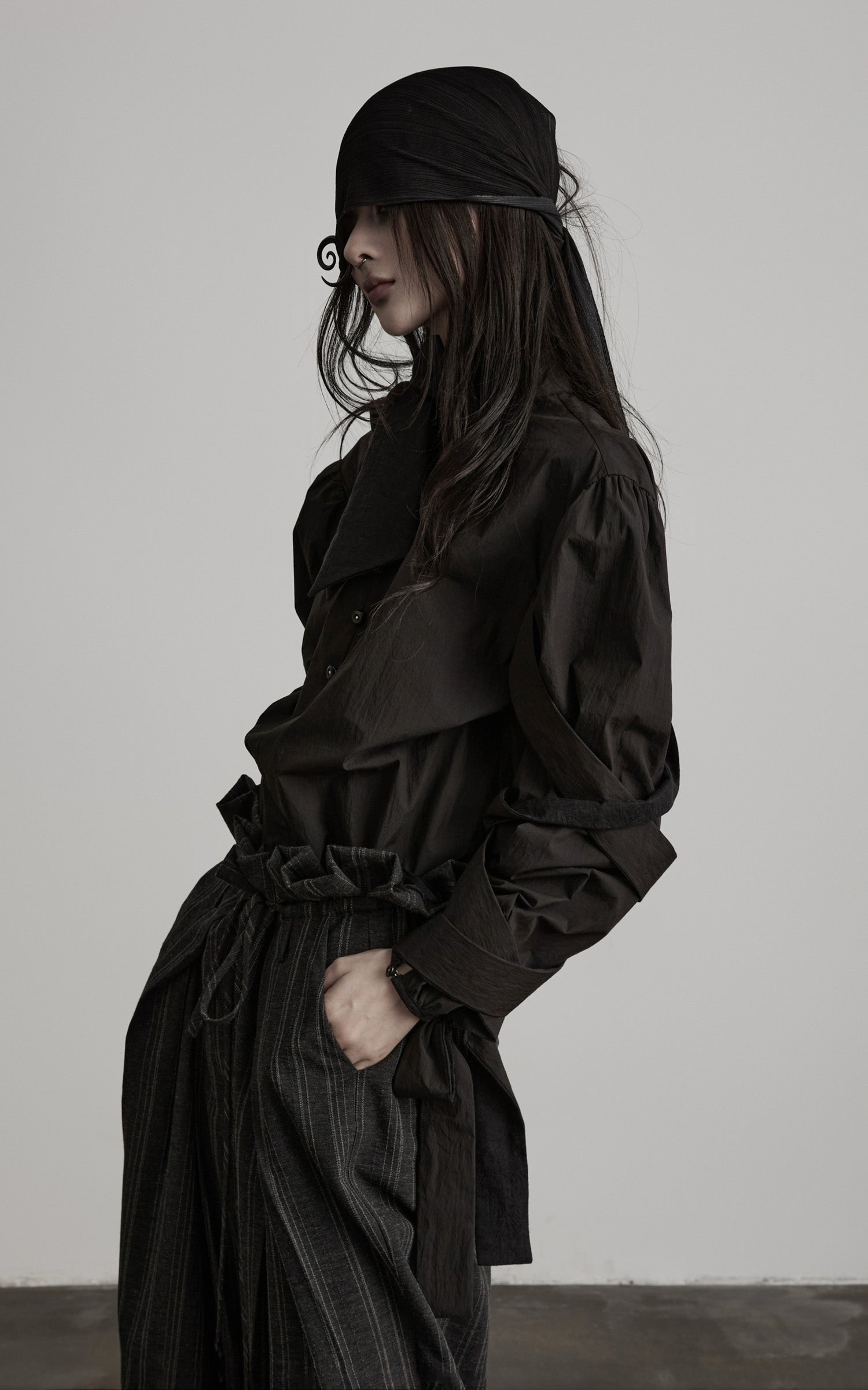 DOINDULGE Sculptural Ribbon Sleeve High Neck Shirt