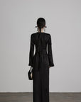 DOINDULGE Pleated Panel Braided Waist Long Sleeve Sculptural Maxi Dress