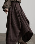 DOINDULGE Shadow Stripe Asymmetric Draped Skirt with Raw Braided Details