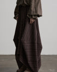DOINDULGE Shadow Stripe Asymmetric Draped Skirt with Raw Braided Details