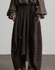 DOINDULGE Shadow Stripe Asymmetric Draped Skirt with Raw Braided Details