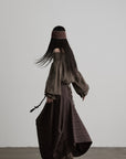 DOINDULGE Shadow Stripe Asymmetric Draped Skirt with Raw Braided Details