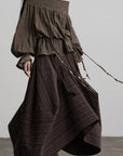 DOINDULGE Shadow Stripe Asymmetric Draped Skirt with Raw Braided Details