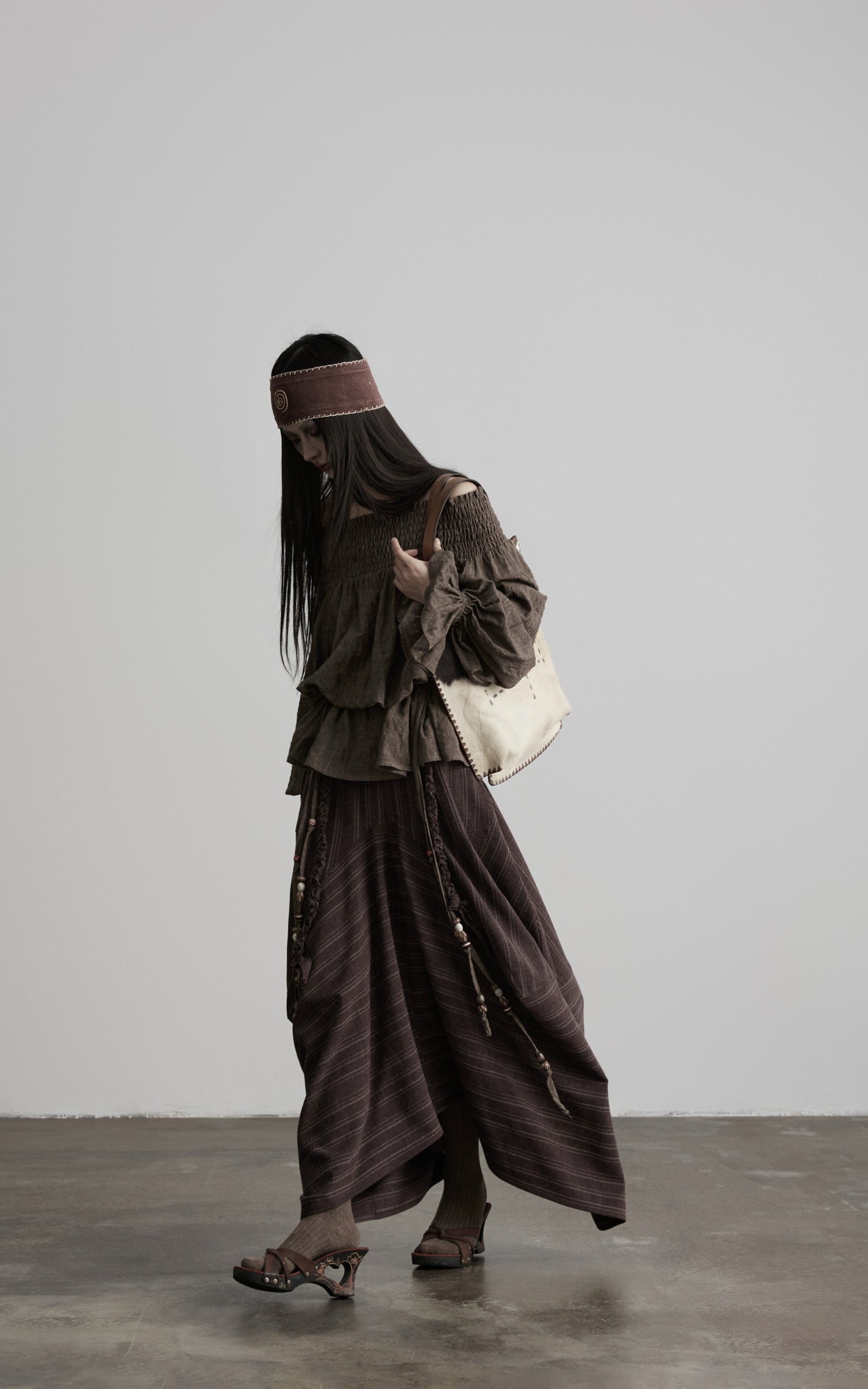 DOINDULGE Shadow Stripe Asymmetric Draped Skirt with Raw Braided Details