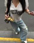 WARDEN EDGE T-shirt à col en V avec slogan