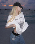 Rase le sol T-shirt graphique vintage délavé "Amor Fati"