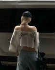 Rase le sol Asymmetric Off-Shoulder Cropped Top